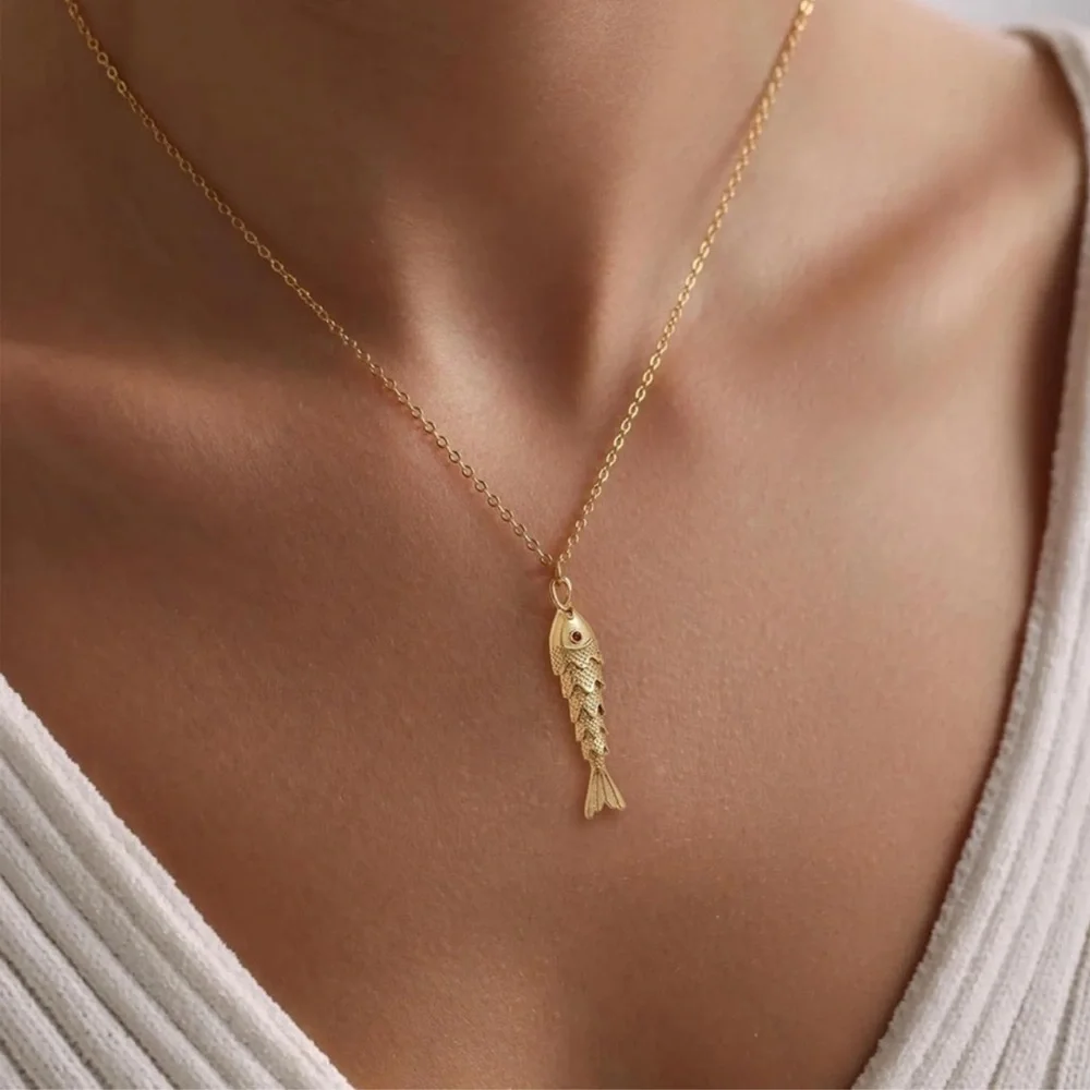 Anthropologie moving Tail Gold Fish Pendant Necklace